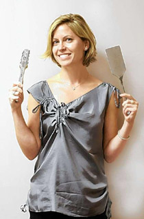 Catherine Neville with cooking utensils